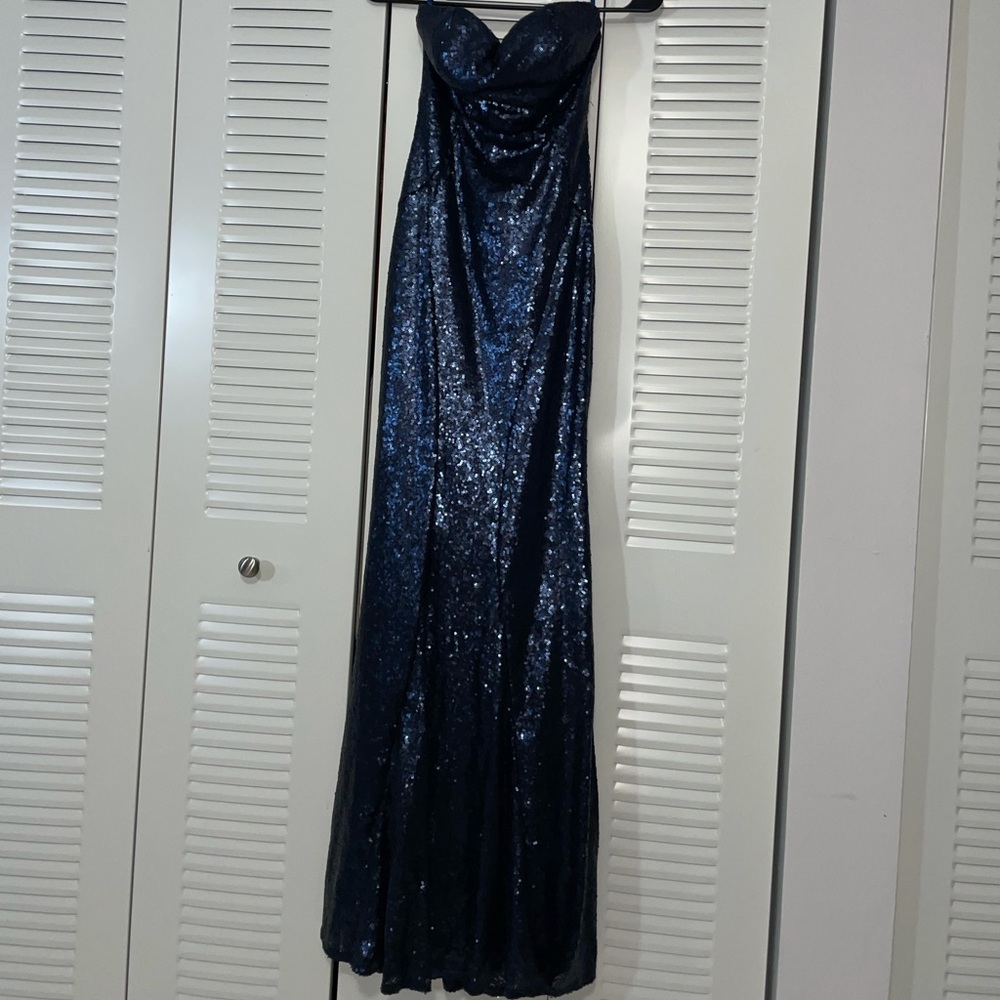 Beautiful long blue dress worn once size xs, good for the holidays or prom